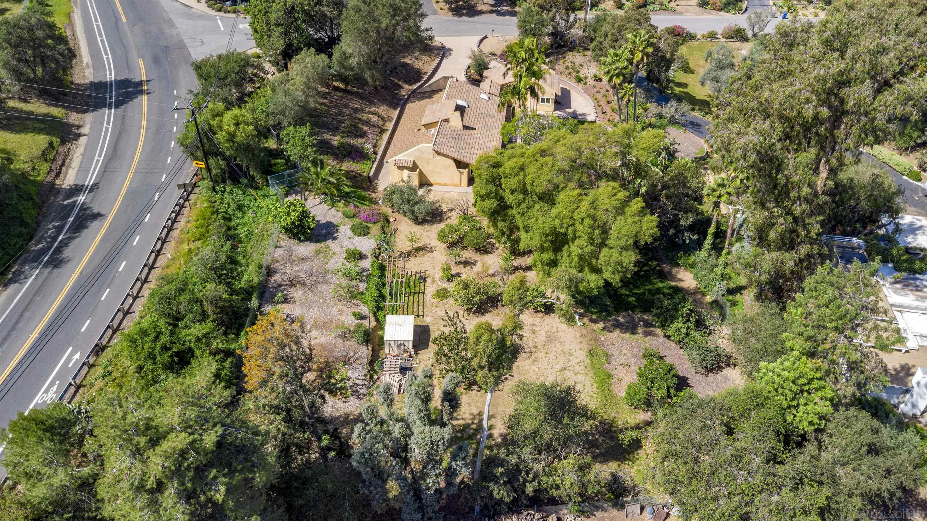 1315 Macadamia Drive Fallbrook, CA 92028 - Photo 3 of 59 an aerial view of houses with yard