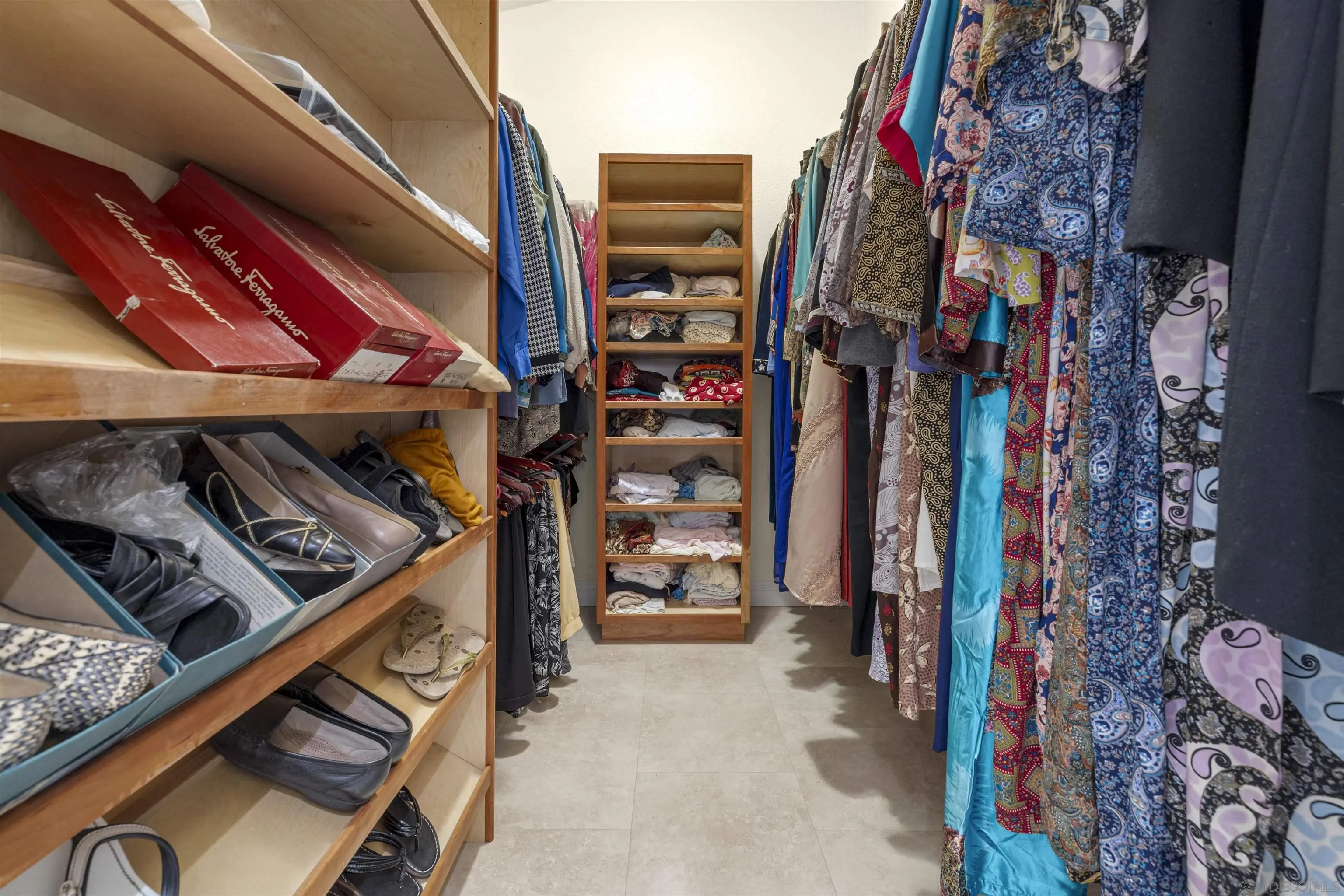 1315 Macadamia Drive Fallbrook, CA 92028 - Photo 32 of 59 a view of walk in closet with clothes