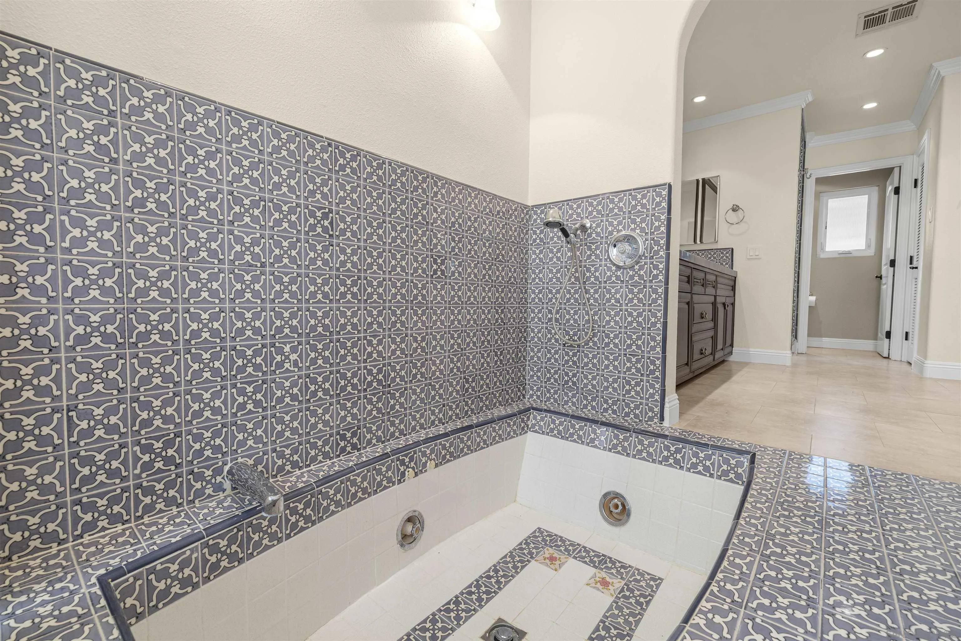 1315 Macadamia Drive Fallbrook, CA 92028 - Photo 37 of 59 a bathroom with a tub a sink and a shower