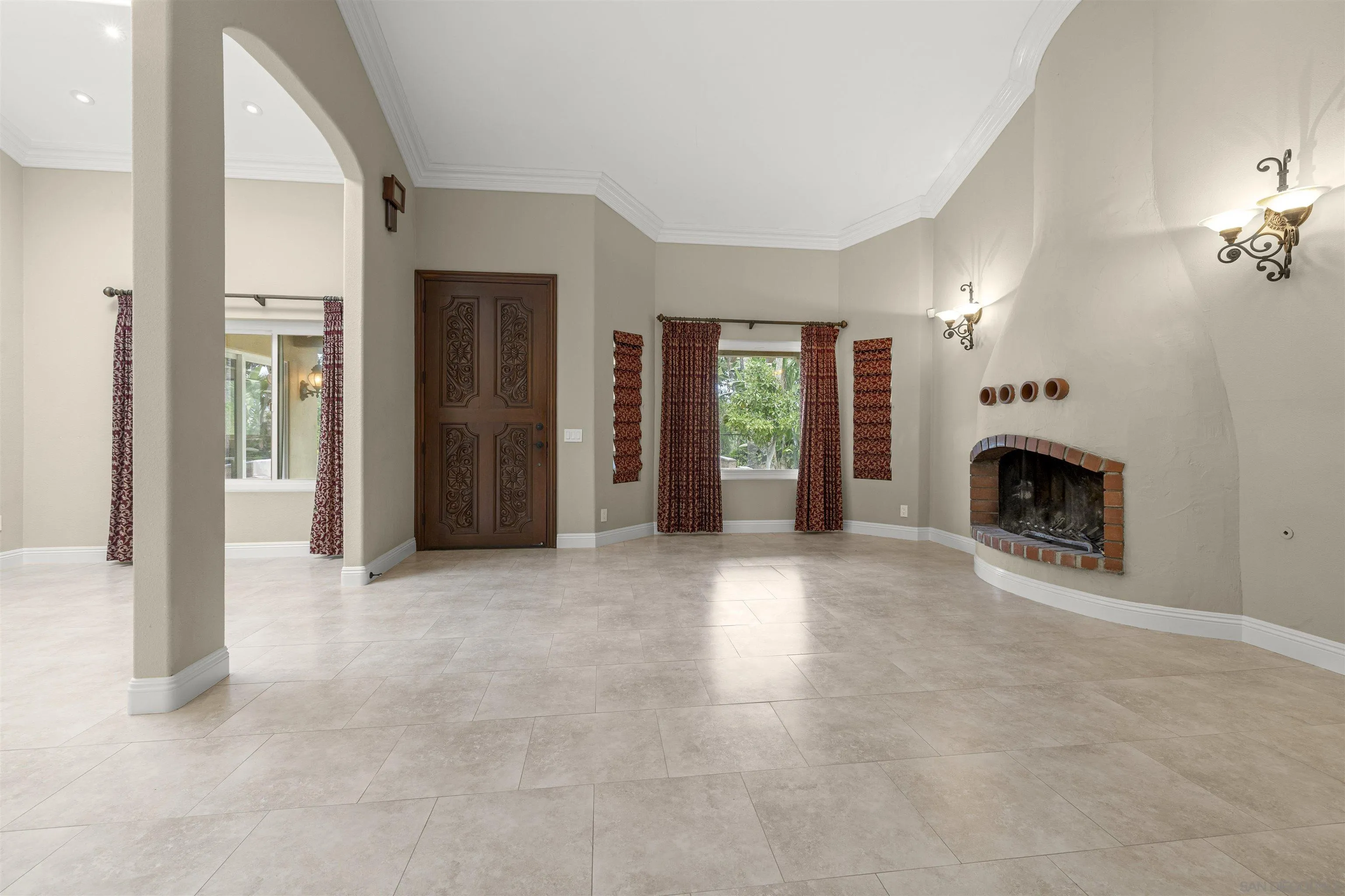 1315 Macadamia Drive Fallbrook, CA 92028 - Photo 39 of 59 an empty room with windows and fireplace