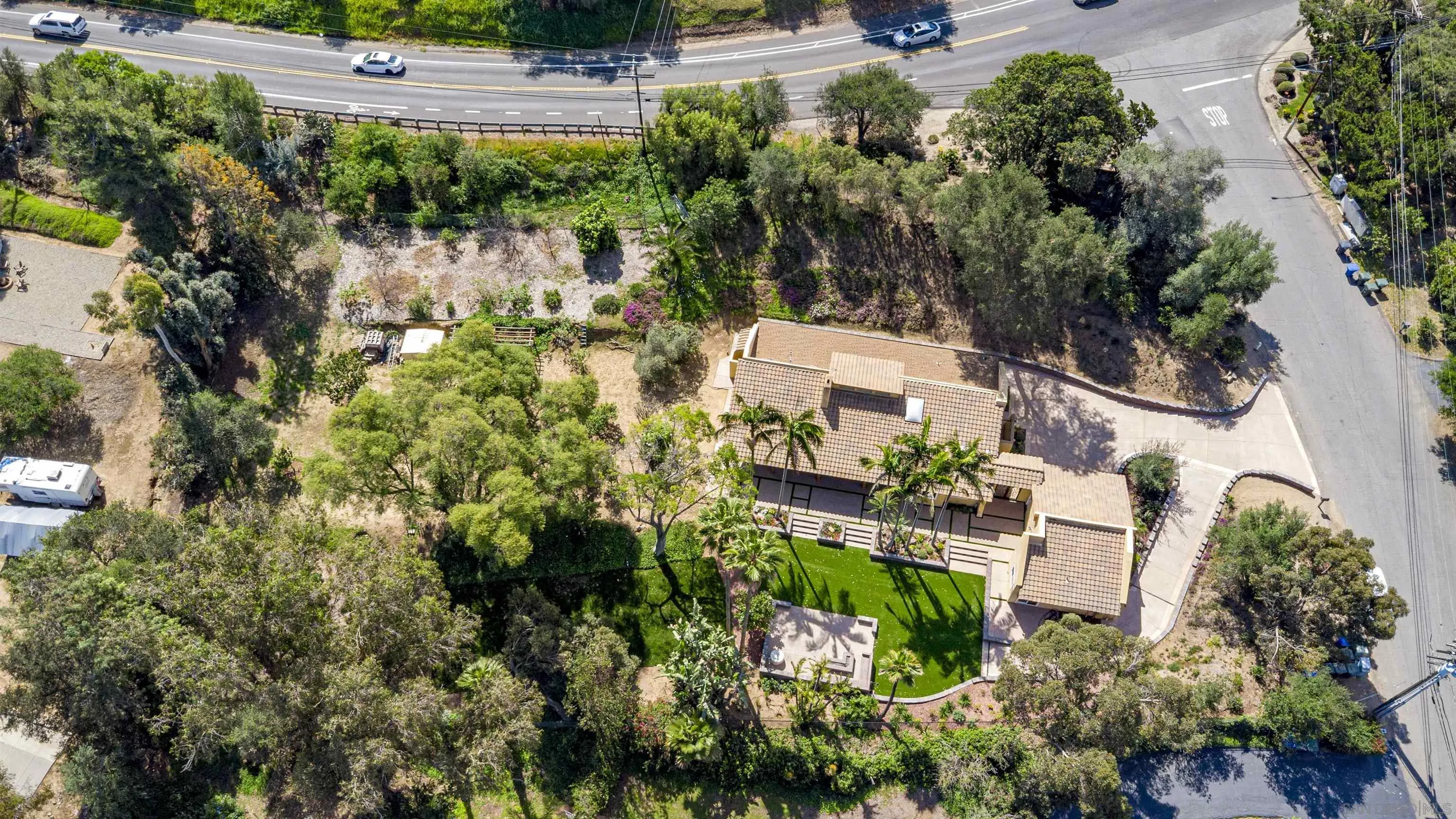 1315 Macadamia Drive Fallbrook, CA 92028 - Photo 4 of 59 an aerial view of residential house with outdoor space and parking
