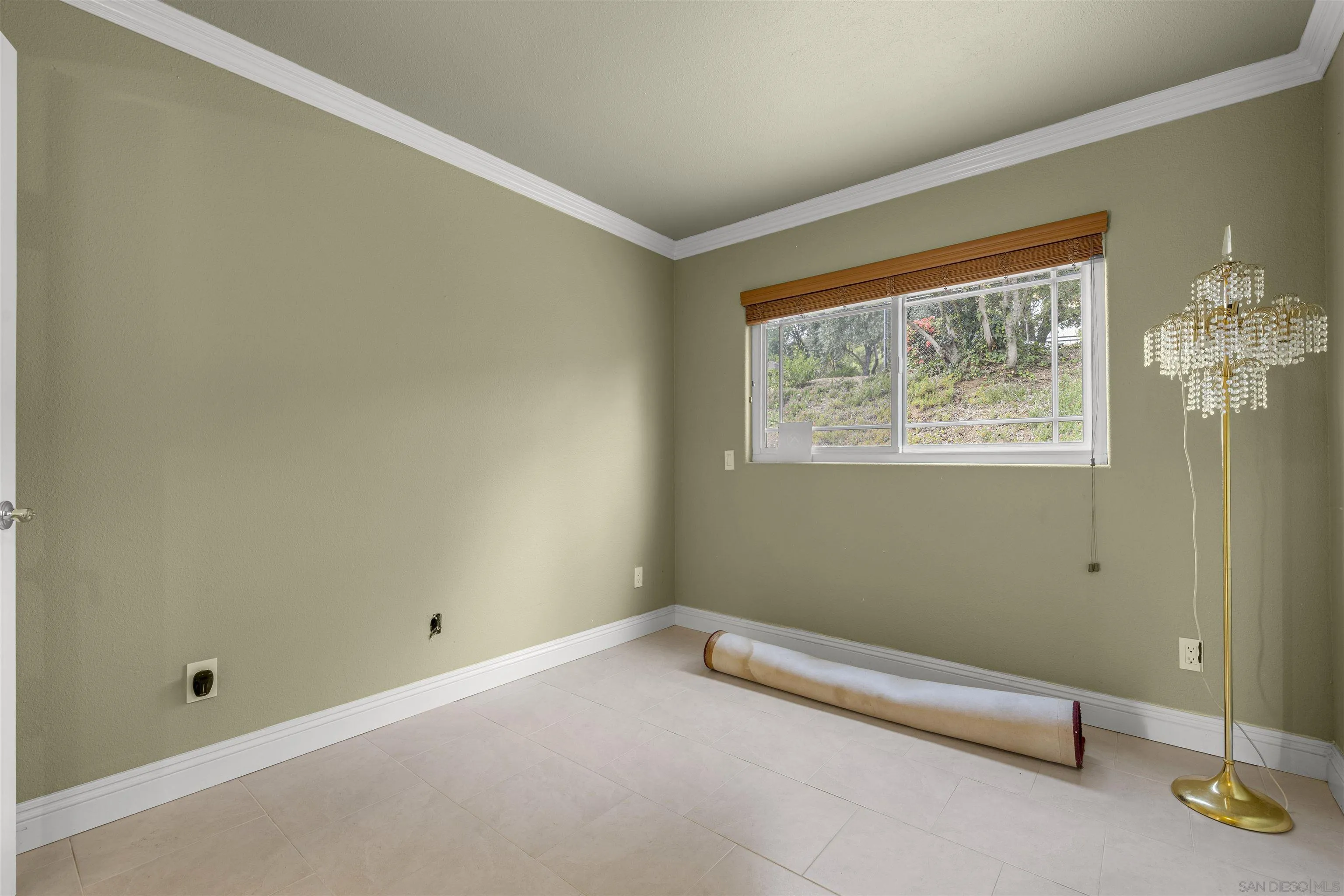1315 Macadamia Drive Fallbrook, CA 92028 - Photo 45 of 59 a view of room with window and a ceiling fan