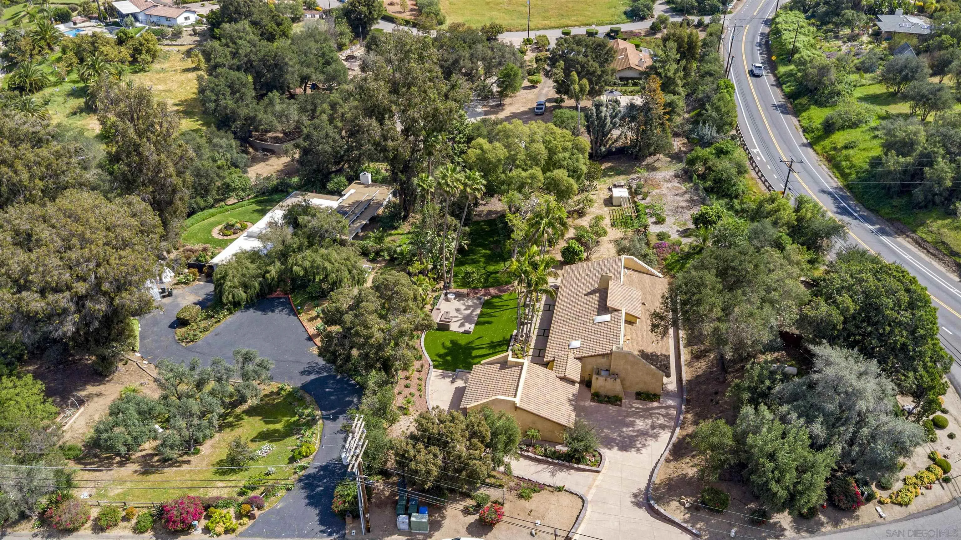 1315 Macadamia Drive Fallbrook, CA 92028 - Photo 5 of 59 an aerial view of residential houses with outdoor space