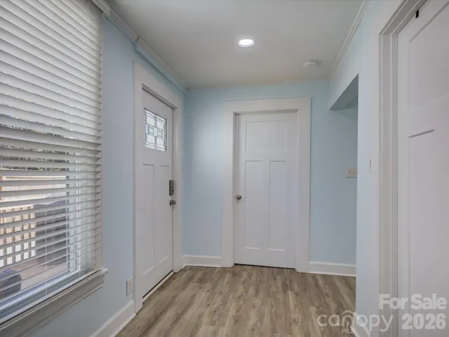 a view of an empty room and window