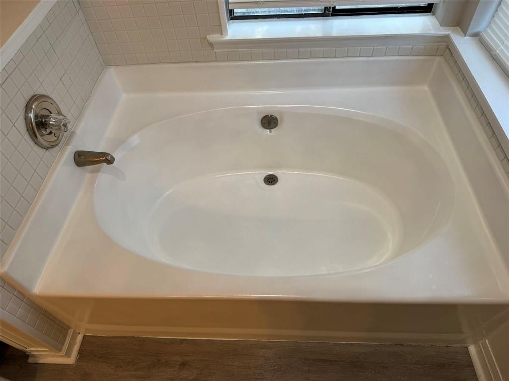 316 Ridgestone Drive Warner Robins, GA 31088 - Photo 19 of 21 a bath tub sitting next to a white sink