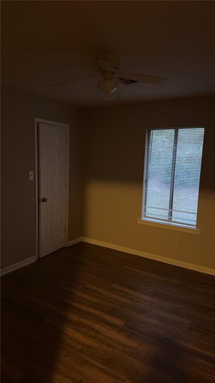 316 Ridgestone Drive Warner Robins, GA 31088 - Photo 8 of 21 a view of an empty room with wooden floor and a window