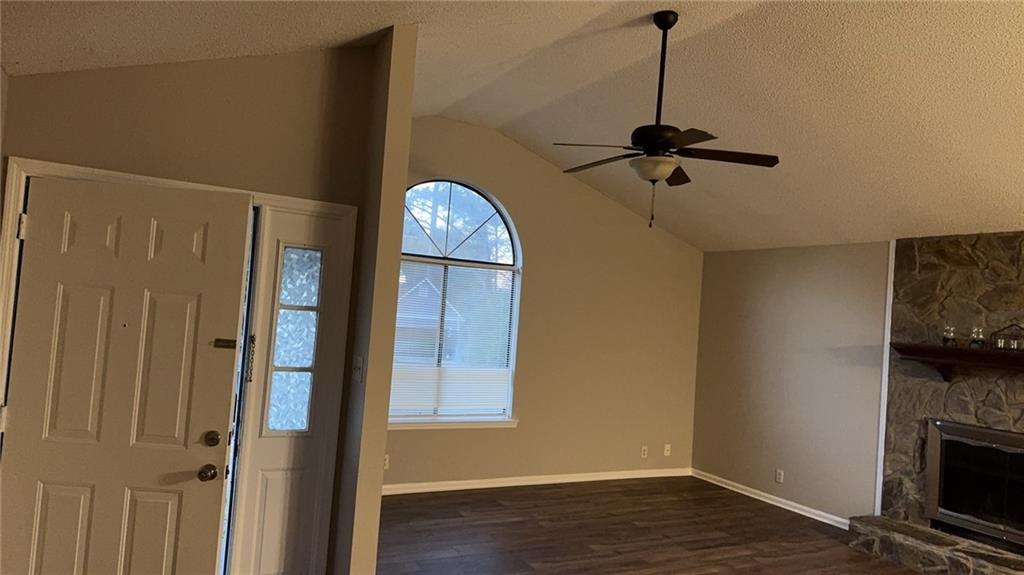 316 Ridgestone Drive Warner Robins, GA 31088 - Photo 9 of 21 a view of empty room with wooden floor and fan