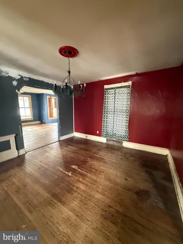 a view of hallway with a couch