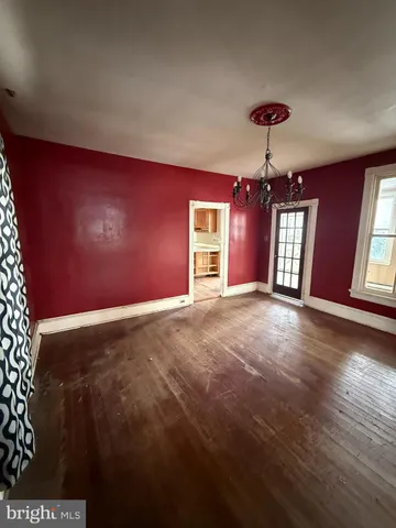 a view of livingroom with hardwood floor and window