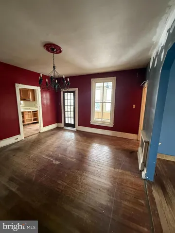 a view of livingroom with hardwood floor and window