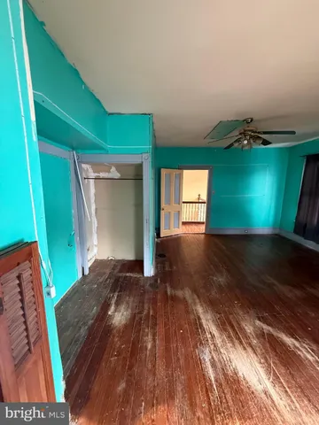 a front view of a house with yard and garage