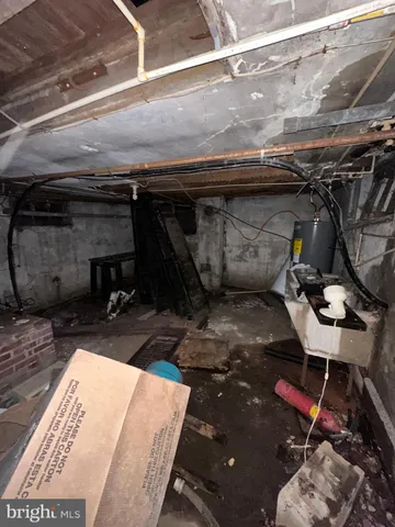 a view of parking garage with cars