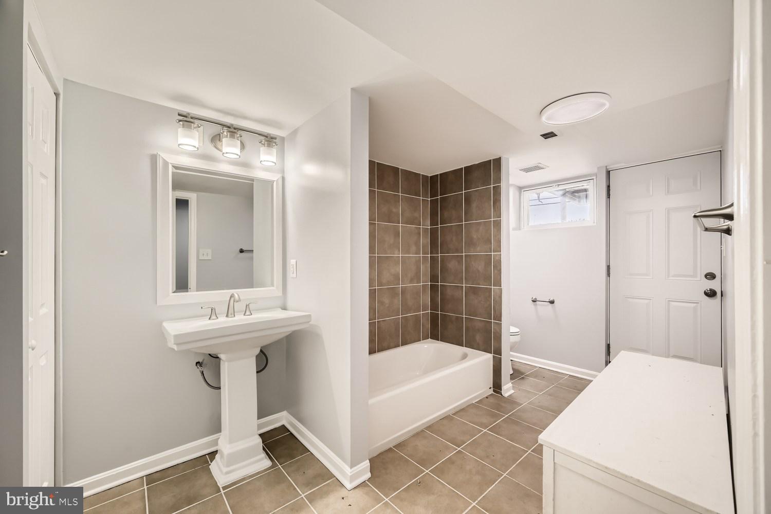 1108 Andover Road Baltimore, MD 21218 - Photo 19 of 21 Basement Full bathroom