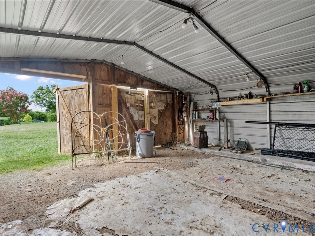 13330 Lodore Road Amelia Court House, VA 23002 - Photo 31 of 33 Garage featuring metal wall