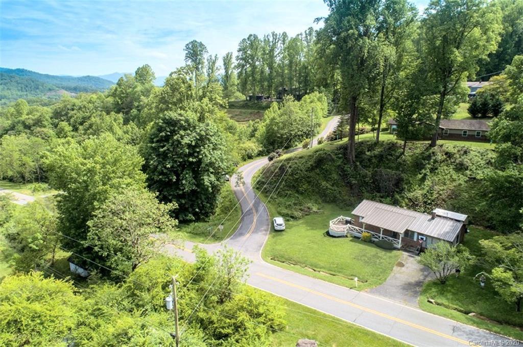 427 Kitchens Branch Road Sylva, NC 28779 - Photo 2 of 27 an aerial view of residential house with outdoor space and trees all around