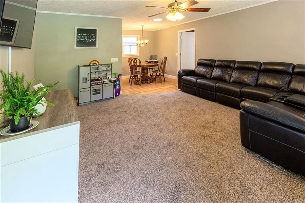 427 Kitchens Branch Road Sylva, NC 28779 - Photo 12 of 27 a living room with furniture and a couch