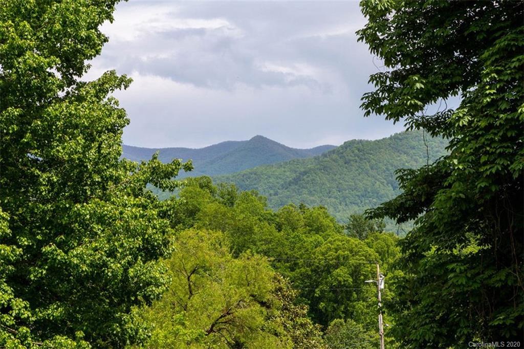 427 Kitchens Branch Road Sylva, NC 28779 - Photo 7 of 27 an aerial view of houses covered in trees