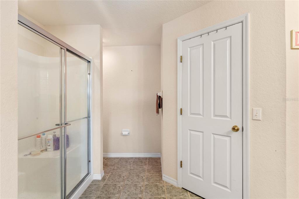 233 Reserve Drive Davenport, FL 33896 - Photo 19 of 25 a bathroom with a shower