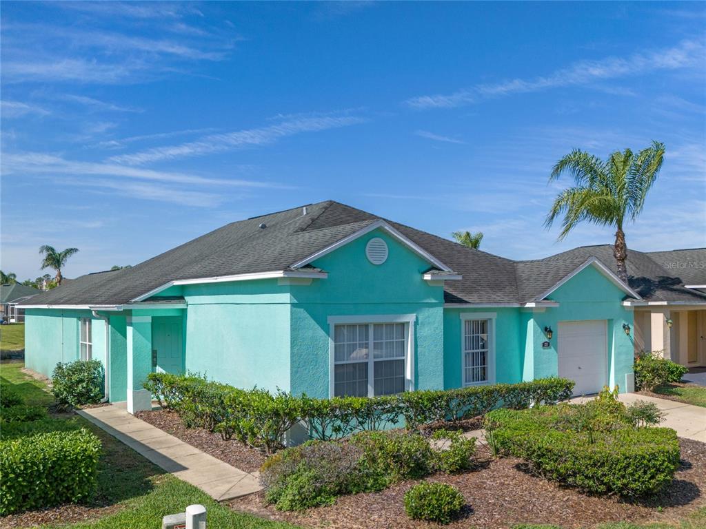 233 Reserve Drive Davenport, FL 33896 - Photo 2 of 25 front view of a house with a yard