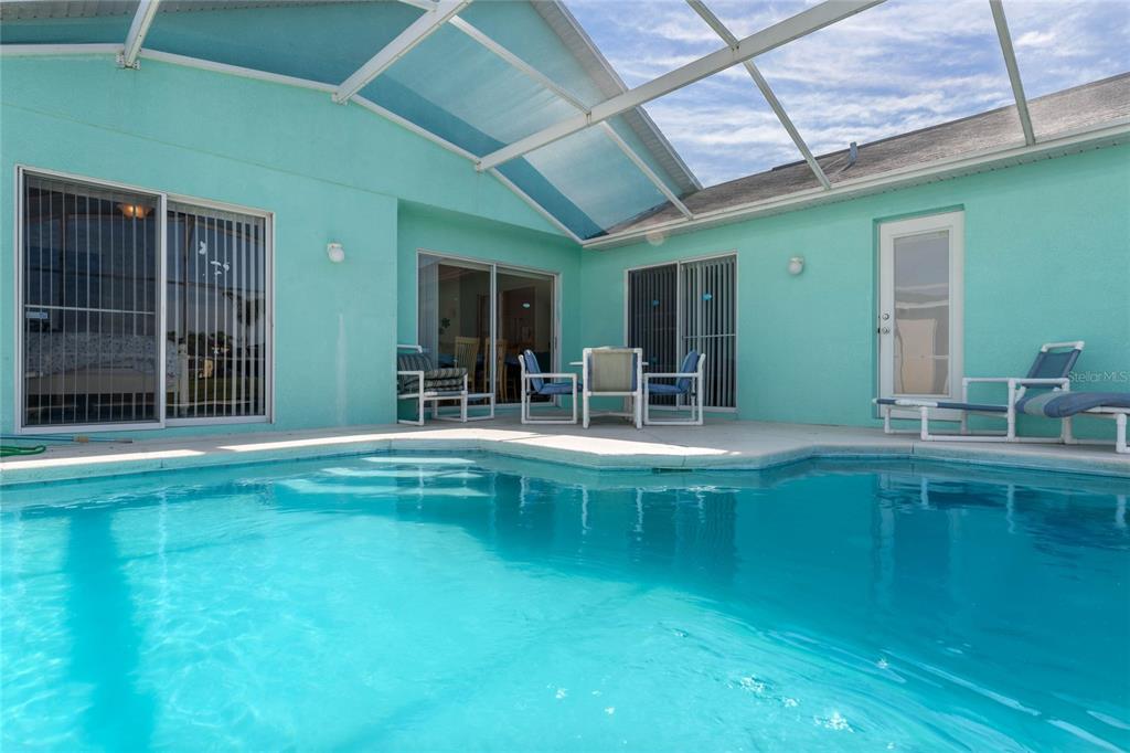 233 Reserve Drive Davenport, FL 33896 - Photo 3 of 25 a view of a swimming pool with a patio