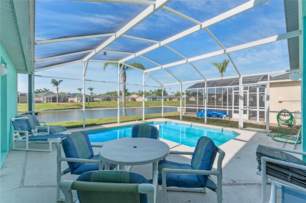 233 Reserve Drive Davenport, FL 33896 - Photo 5 of 25 a view of a dining room with furniture window and outside view