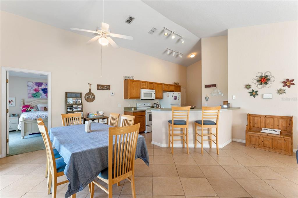 233 Reserve Drive Davenport, FL 33896 - Photo 9 of 25 a view of a dining room with furniture