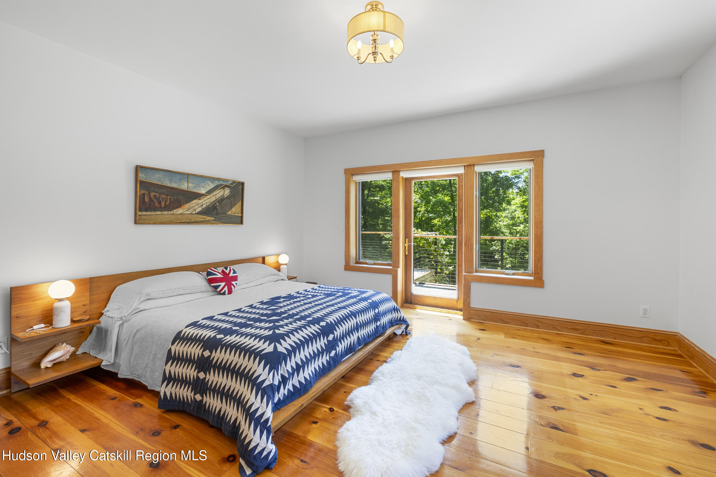 592 Swartekill Road Esopus, NY 12561 - Photo 11 of 38 a bedroom with a bed and a window