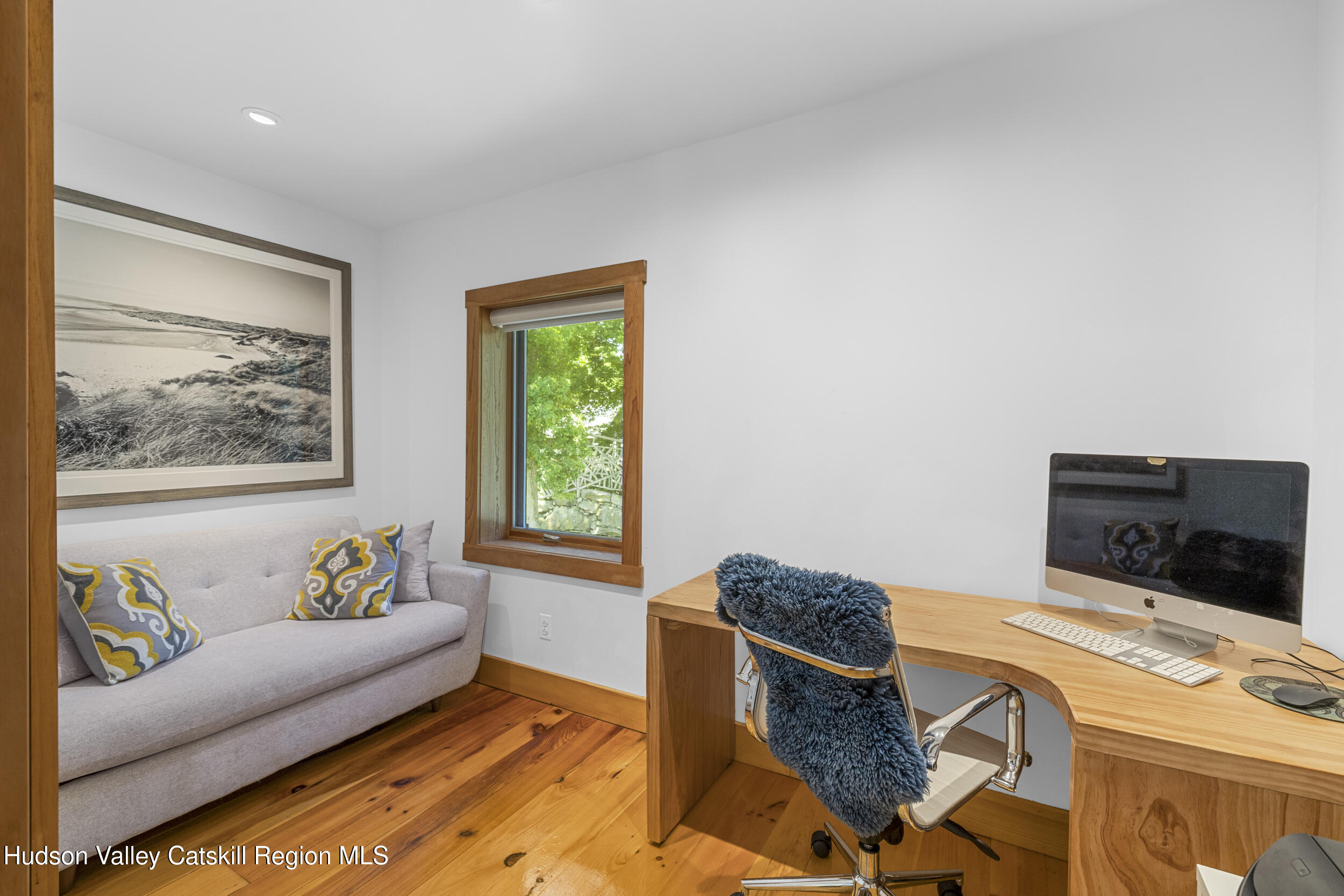 592 Swartekill Road Esopus, NY 12561 - Photo 18 of 38 a living room with furniture and a flat screen tv
