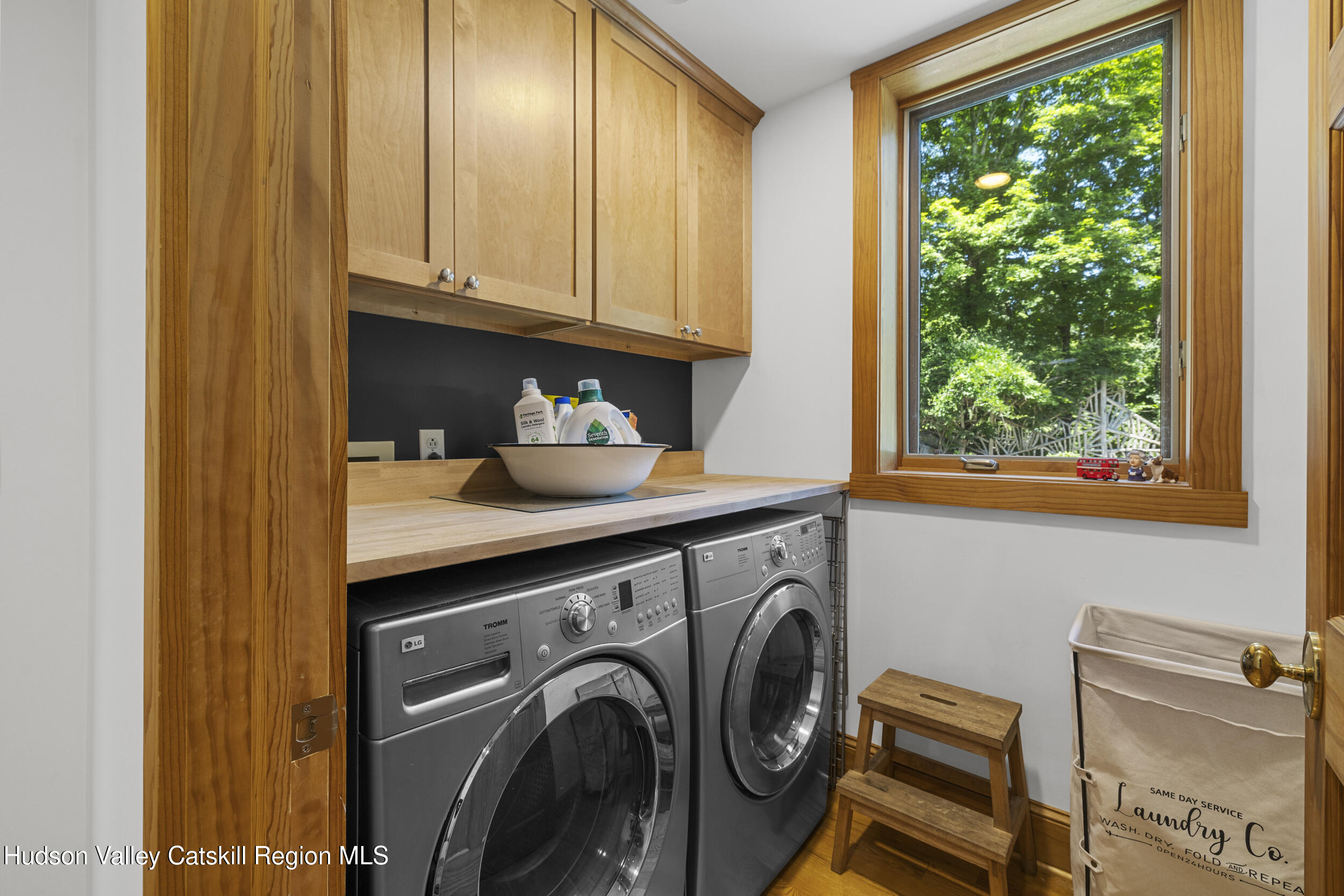 592 Swartekill Road Esopus, NY 12561 - Photo 19 of 38 a view of a storage and utility room with washer and dryer