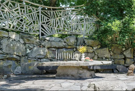 a view of fountain along with trees