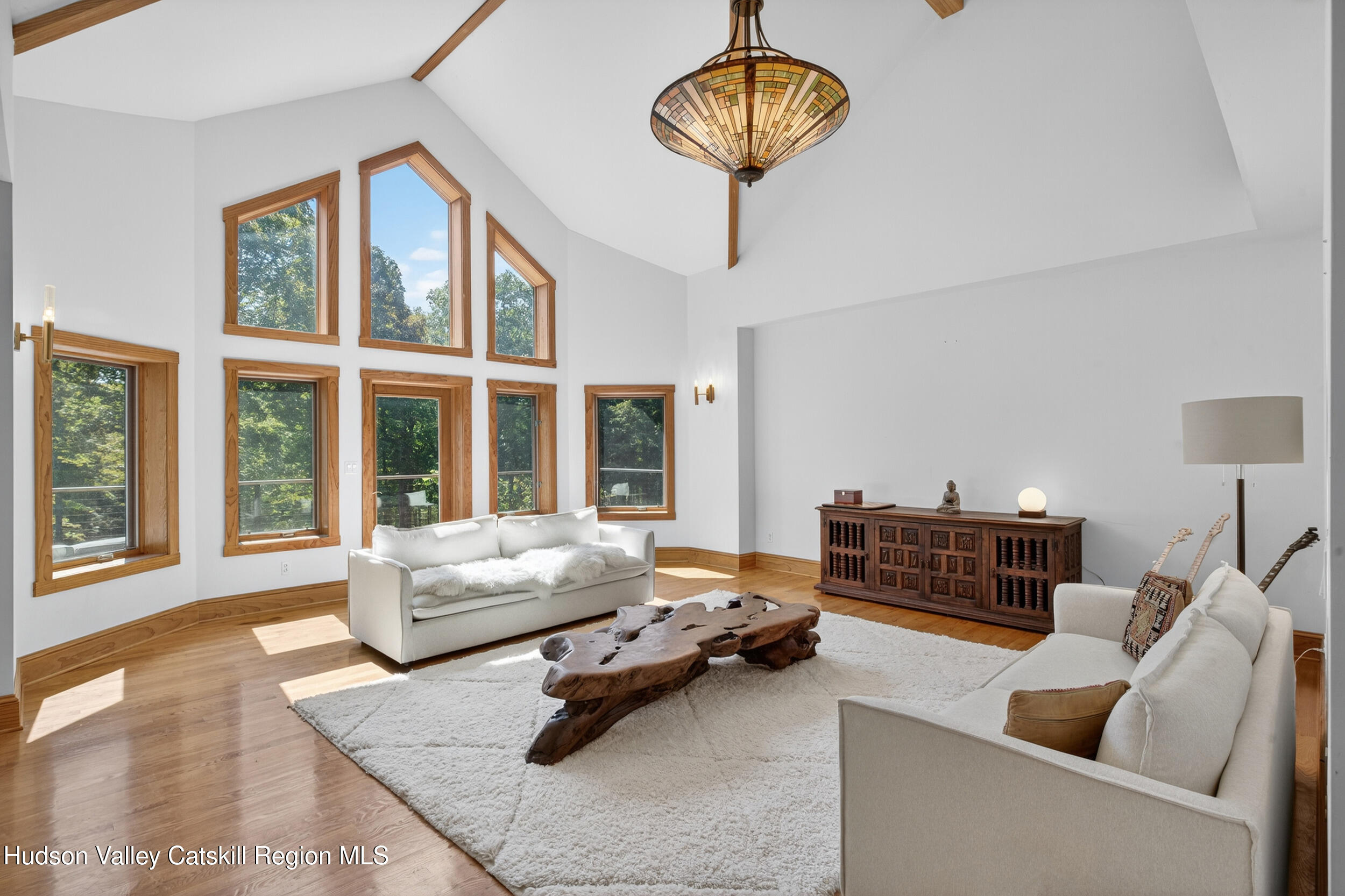 592 Swartekill Road Esopus, NY 12561 - Photo 6 of 38 a living room with furniture or couch and a large window