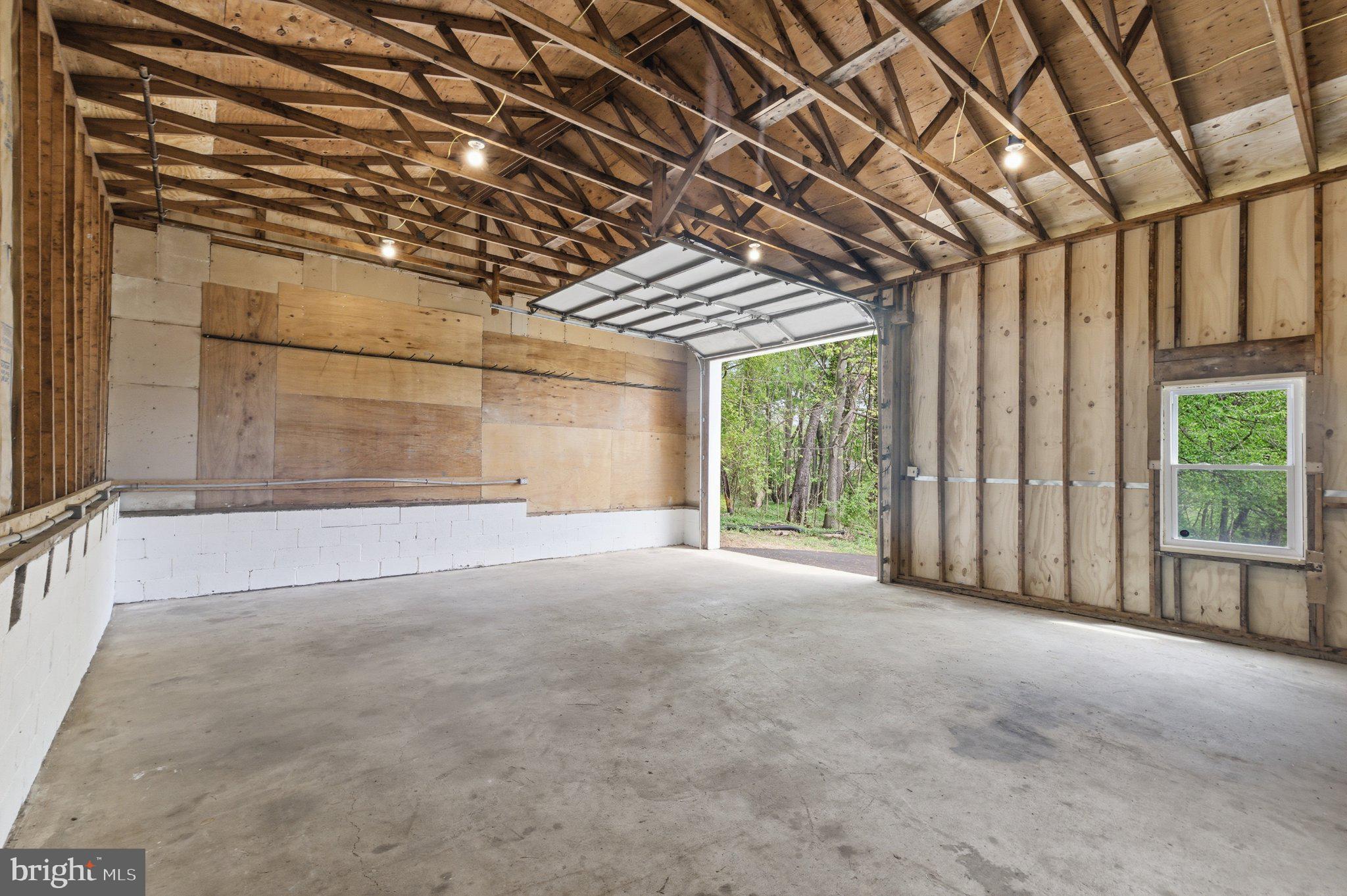 3624 Kemptown Church Road Monrovia, MD 21770 - Photo 7 of 68 Spacious 3 car garage with 10' x 10' rollup door.