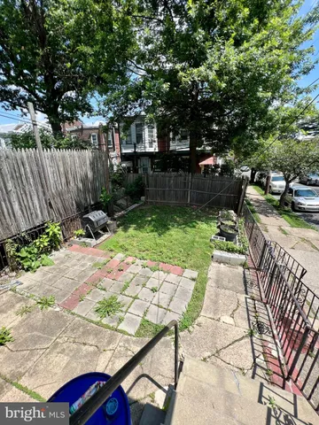 a garden view with a seating space