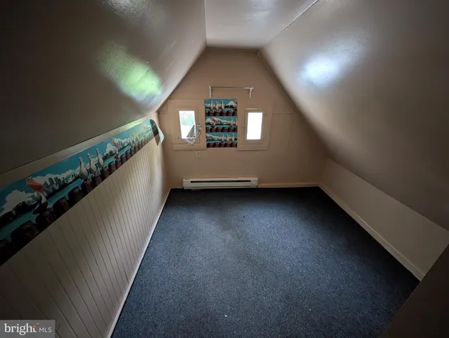 a view of a stairs in an empty room