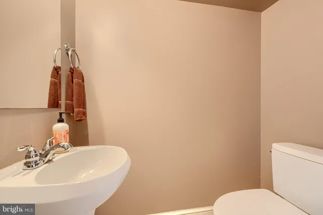 a bathroom with a sink and a toilet