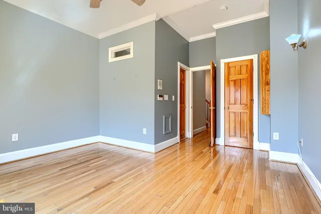 a bathroom with a sink a mirror and a shower