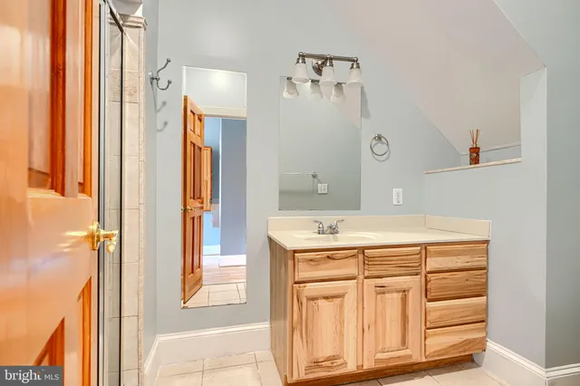 a bathroom with a sink toilet and vanity