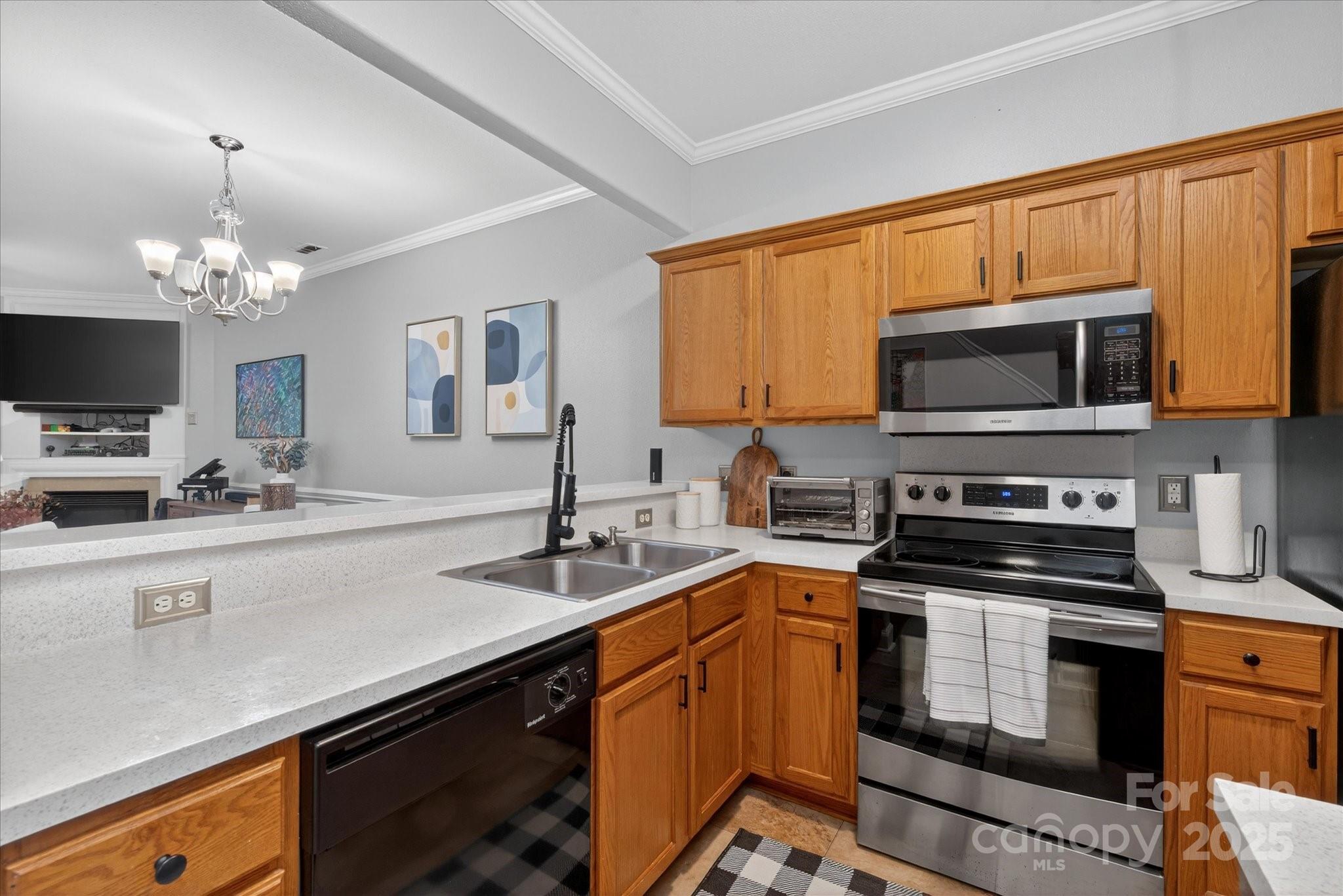 6331 Rhodins Lane Fort Mill, SC 29707 - Photo 12 of 45 a kitchen with a sink stove and microwave
