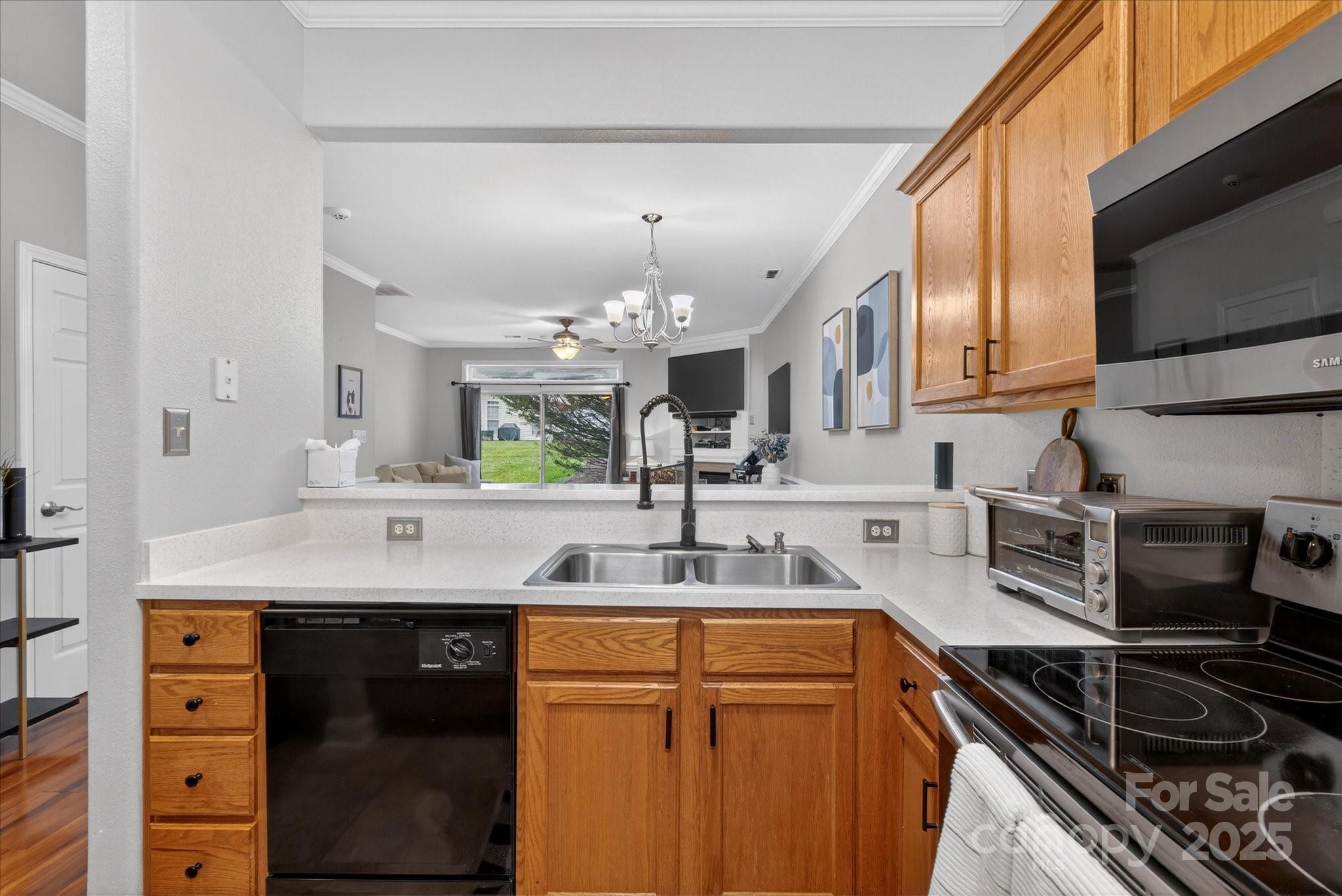 6331 Rhodins Lane Fort Mill, SC 29707 - Photo 16 of 45 a kitchen with a sink and cabinets