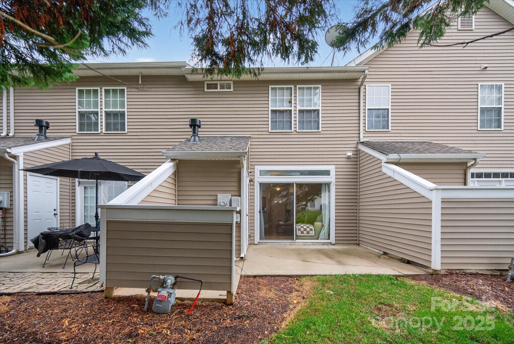 6331 Rhodins Lane Fort Mill, SC 29707 - Photo 30 of 45 a front view of a house with a yard