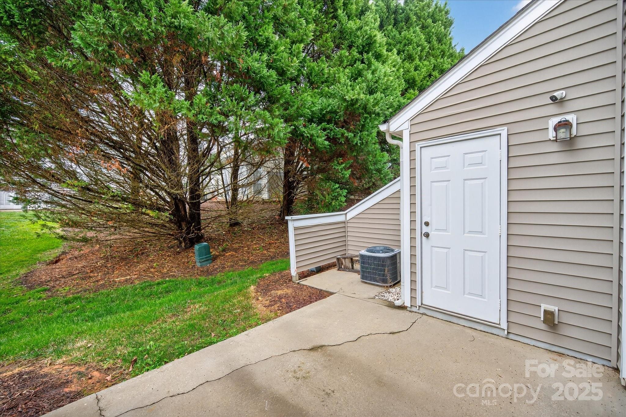 6331 Rhodins Lane Fort Mill, SC 29707 - Photo 32 of 45 a view of a house with a yard and garage