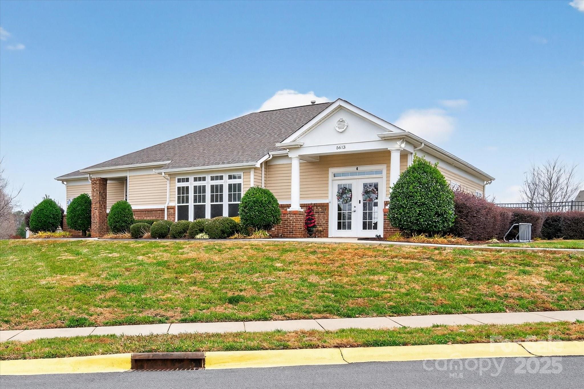 6331 Rhodins Lane Fort Mill, SC 29707 - Photo 38 of 45 a front view of a house with a yard