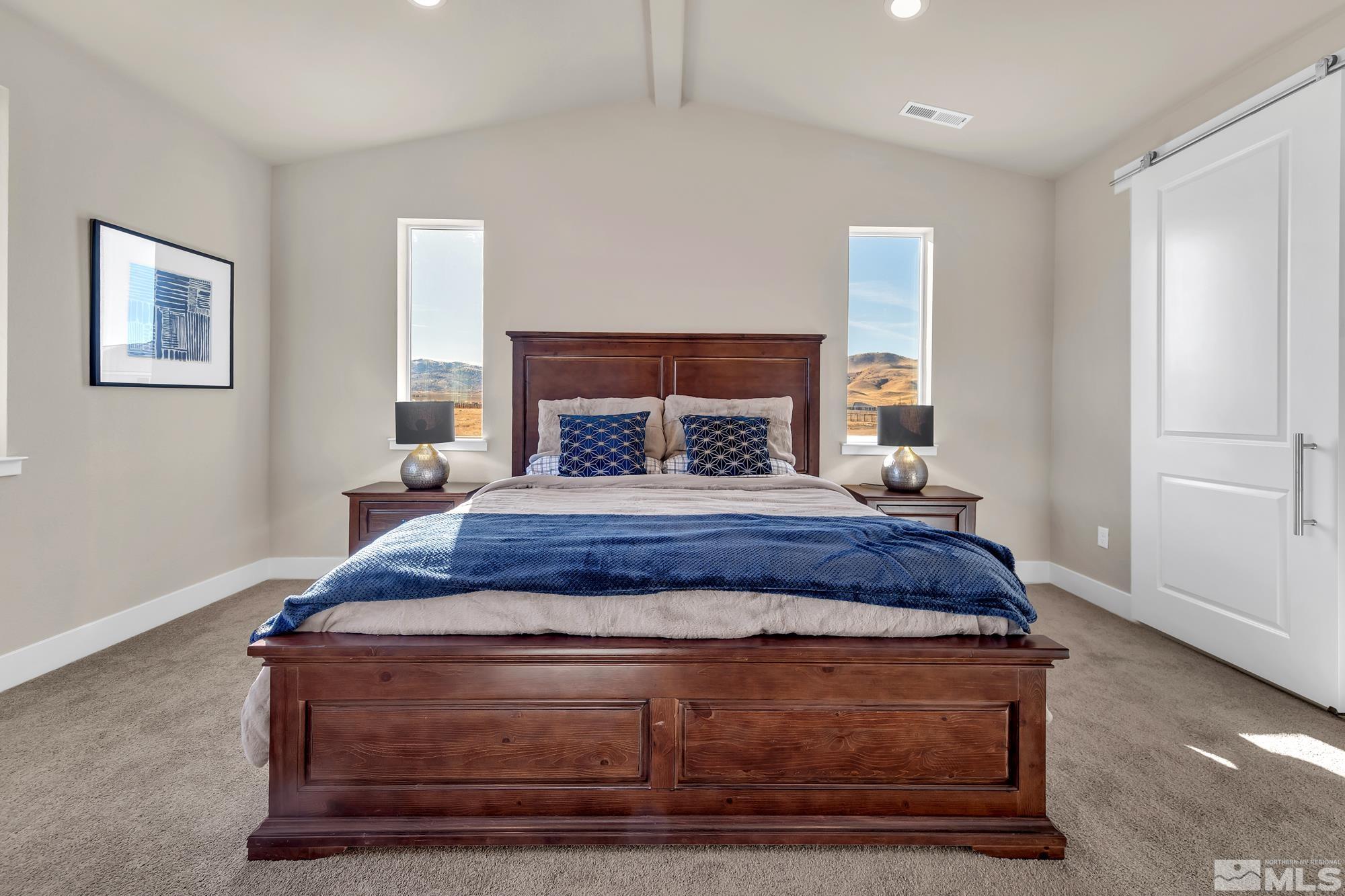 250 Pinto Ranch Court Reno, NV 89510 - Photo 11 of 39 a bedroom with bed and window