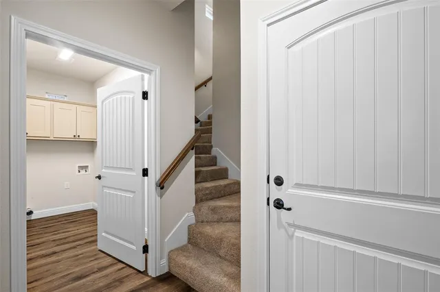 a bathroom with a shower sink and mirror