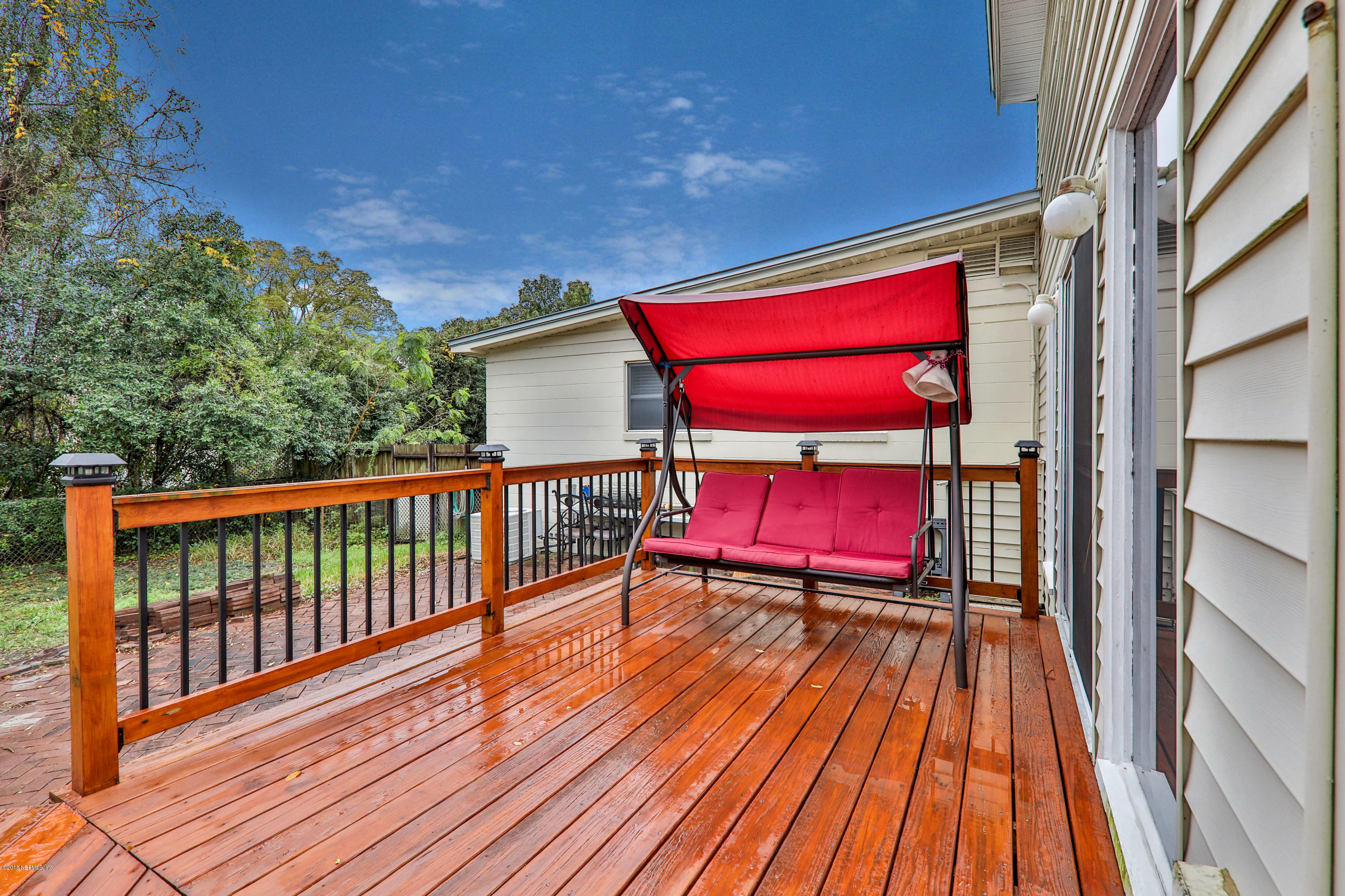 2519 Sam Road Jacksonville, FL 32216 - Photo 26 of 26 a view of a balcony with chairs