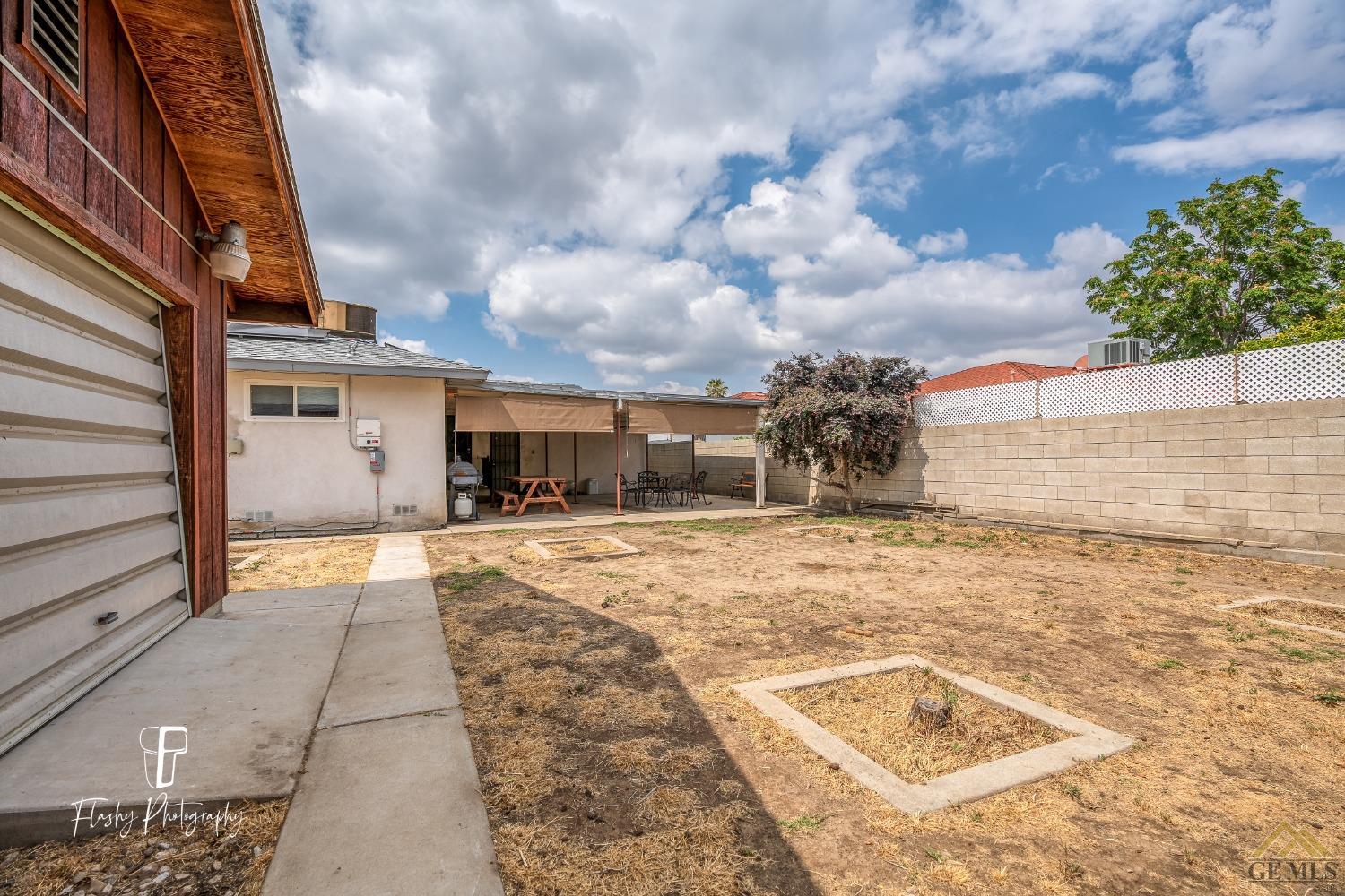 Undisclosed Address Bakersfield, CA 93304 - Photo 35 of 38 a view of a terrace with a barbeque