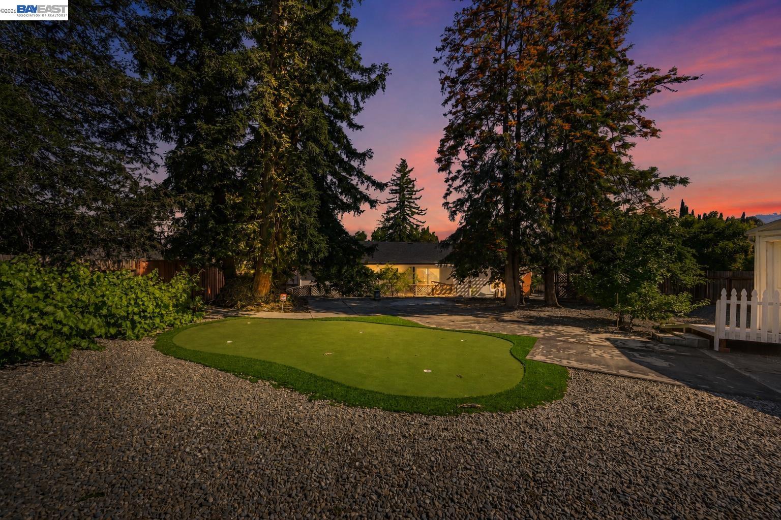 540 Hamilton Way Pleasanton, CA 94566 - Photo 55 of 66 a view of a swimming pool with a yard and trees