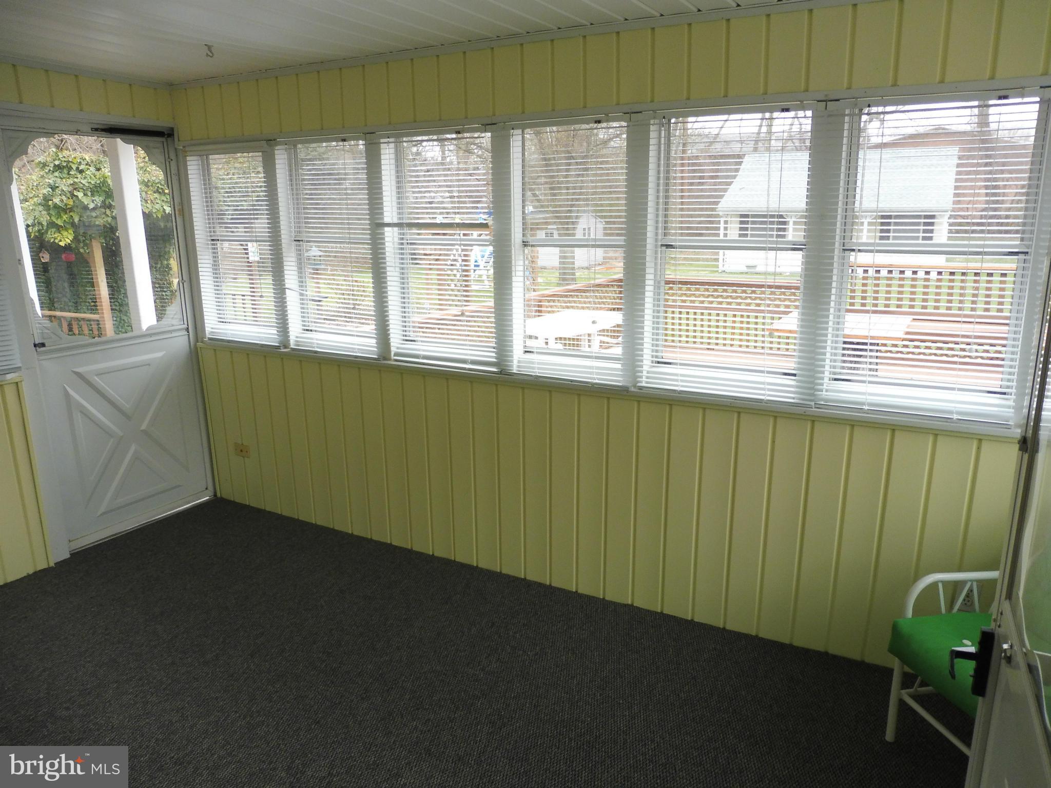 10310 Greentop Road Cockeysville, MD 21030 - Photo 18 of 30 Enclosed Porch exit to rear patio/yard