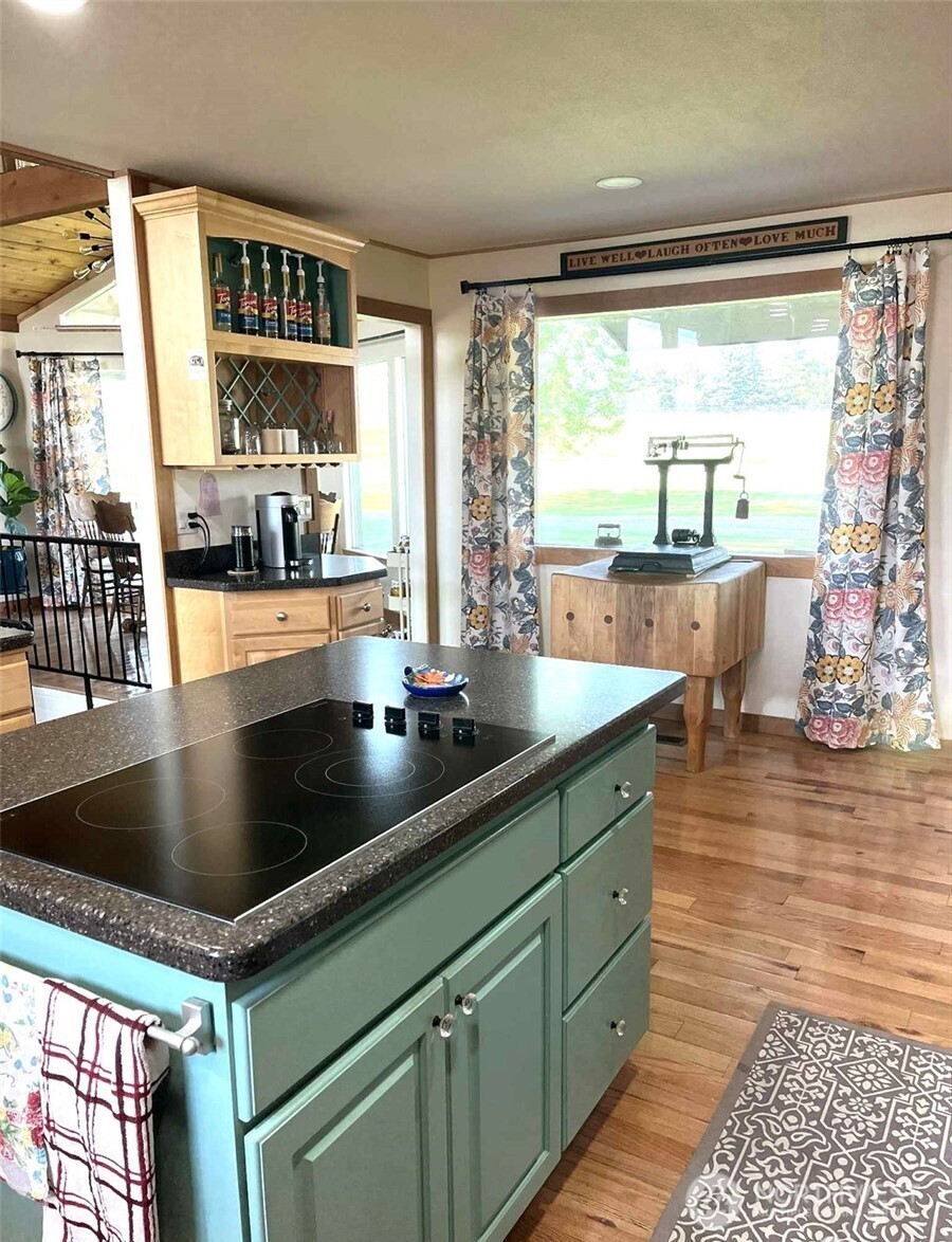 8 Mundinger Lane Omak, WA 98841 - Photo 11 of 37 a kitchen with stainless steel appliances granite countertop a sink window and cabinets