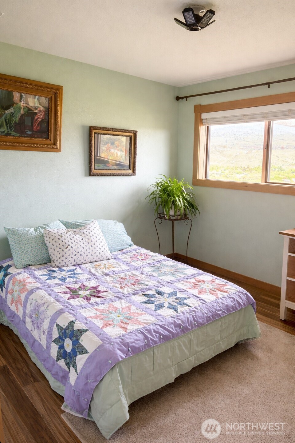 8 Mundinger Lane Omak, WA 98841 - Photo 17 of 37 a bedroom with a bed and a window